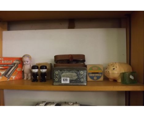 SHELF WITH PLASTIC PIG MONEY BOX, COOKIE &amp; BISCUIT MAKER &amp; OTHER BRIC-A-BRAC