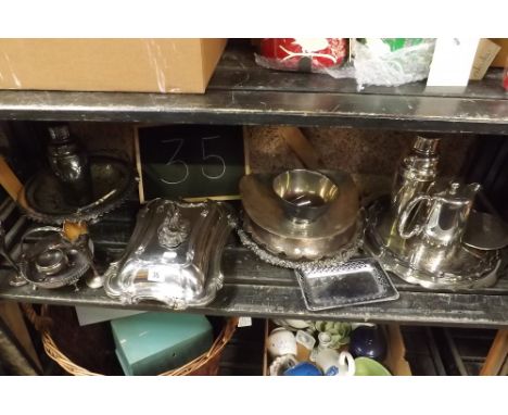 SHELF OF PLATEDWARE INCL; COCKTAIL SHAKERS, TRAYS, WATER JUG &amp; 2 TULIP FLOWER HOLDERS