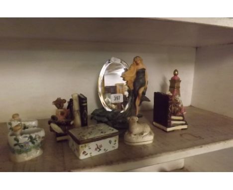 SHELF OF ORNAMENTS