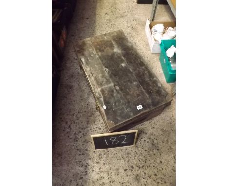 A STEEL TRAVEL TRUNK WITH HANDLES
