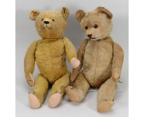 Two English golden mohair Teddy bears, first with boot button eyes, stitched nose, mouth and claws, swivel heads and jointed 