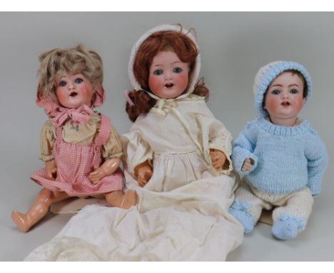 Three bisque head baby dolls, including Simon &amp; Halbig 126 character baby doll with weighted blue glass eyes, open mouth 