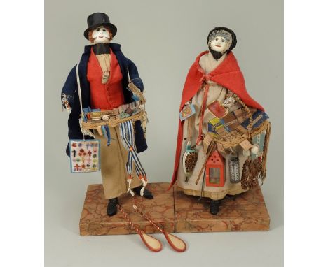 A good pair of C&amp;H White peddler dolls, English 1840s, the gentleman and lady dolls each with leather head, black bead gl