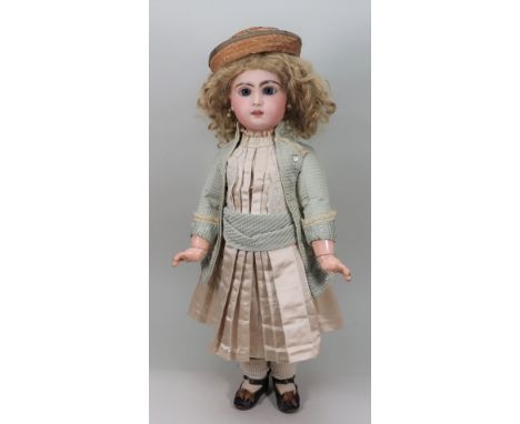 Tete Jumeau bisque head Bebe doll, size 10, French circa 1890, the pale bisque head with fixed blue glass paper-weight eyes, 