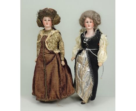 Pair of interesting bisque shoulder head lady dolls, German circa 1910, each with turned head, fixed glass eyes, finely paint