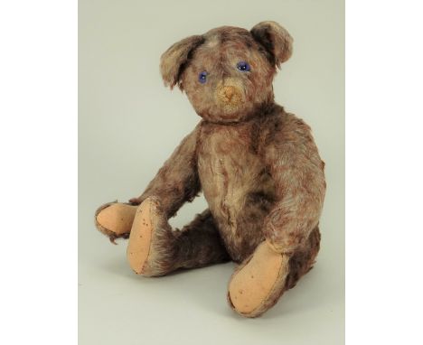 A rare small size Steiff ‘Petsy’ Teddy bear, German circa 1928, the straw filled bear with tipped cream mohair, blue and blac