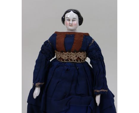 Early glazed china shoulder head doll, German, circa 1860s, with painted features, blue eyes with red line for lids and mould