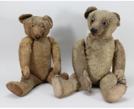 Four early English Teddy bears, including a brown mohair bear, possibly by William J Terry, with large glass eyes, long muzzl