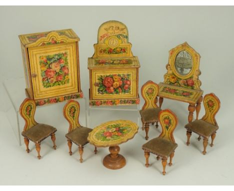 Bedroom suite of wooden paper lithographed Dolls House furniture, German 1880s, with flower garland decoration light wood eff