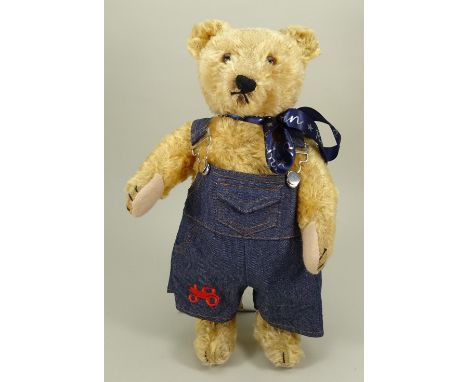 A golden mohair Steiff Original Teddy bear, 1950s, the straw filled bear with brown glass eyes, stitched nose, mouth and claw