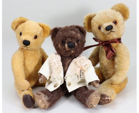 Three post-war Chad Valley mohair Teddy bears, including a dark brown mohair bear with orange glass eyes black stitched nose 