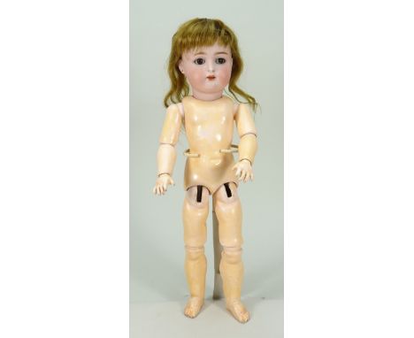A Kammer &amp; Reinhardt/S&amp;H bisque head doll, German circa 1910, with weighted brown glass eyes, raised brows, open mout