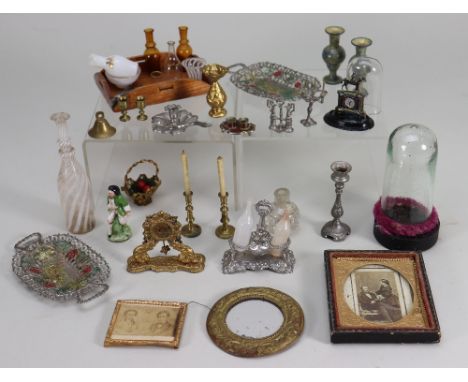 A small collection of dolls house miniatures, including a gilt metal mantle clock, 1 ½” (4cm) tall, vase, soft metal decanter