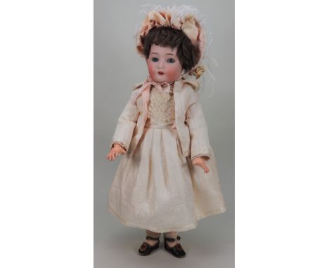 A Kammer &amp; Reinhardt/S&amp;H bisque head doll, German circa 1910, with weighted blue glass eyes, open mouth, upper teeth 
