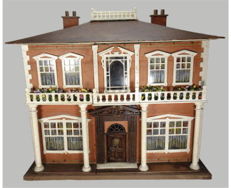 A good English made wooden Dolls House, probably ‘Hobbies House’ from Handicraft planes, circa 1920, the exterior with paper 