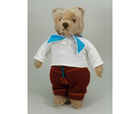 A light brown mohair Steiff Original Teddy bear, 1950s, the straw filled bear with brown glass eyes, brown stitched nose, mou