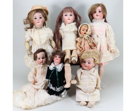 Collection of five various bisque head dolls, including a Simon &amp; Halbig 1078 with weighted brown glass eyes, open mouth,