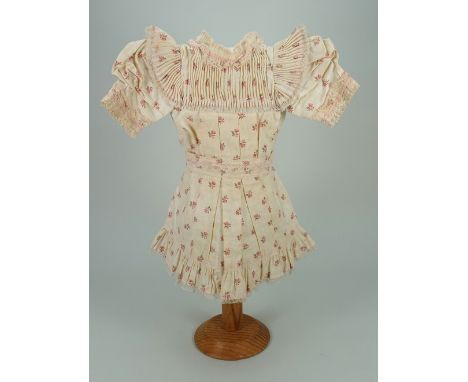 Original Bebe Jumeau Dolls dress, circa 1890, the cream cotton dress with floral print pattern, lace trim, ruff to neck and s