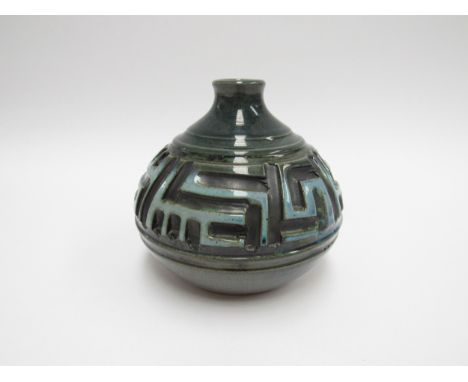 A Poole Atlantis range vase by Carol Kellett in blue and green colours. A52 mark to base. 12.5cm high 