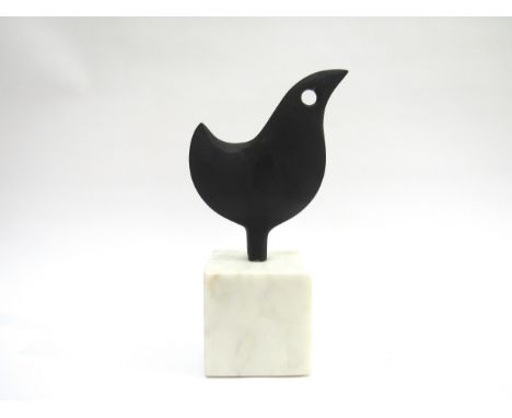 A stylised metal bird sculpture on white stone base, unmarked. 22cm high 