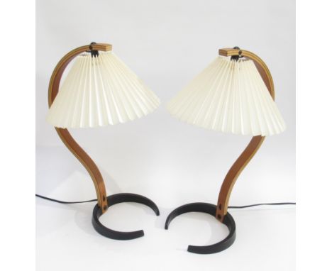 A pair of 1970's Caprani table lamps in laminated wood and iron with original pleated shades. 49cm high. Comes with vendors P