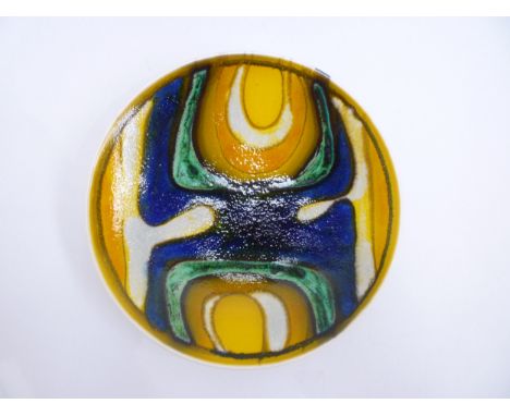 A Poole Delphis circa 1964-7 plate in yellow and blue and green colours. Blue back stamp, 20cm diameter 
