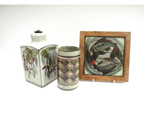 COLIN KELLAM (1942-2020) A studio pottery Fuschia lamp base, framed fish tile and a geometric pattern cylindrical vase, talle