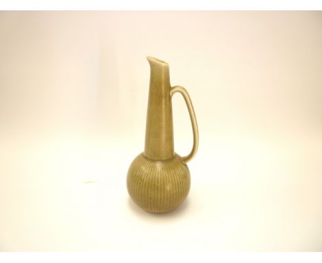 A Rorstrand Gunnar Nylund vase in olive green glaze with single handle. Printed marks to base.  24cm high 