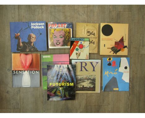 A collection of art books relating to Pop Art and modern abstract art including Kandinsky, Andy Warhol, Joan Miro, Jackson Po