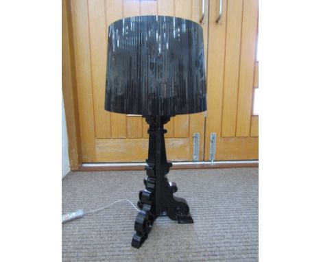 A black 'Kartell' table lamp base with plastic shade. 74cm high 