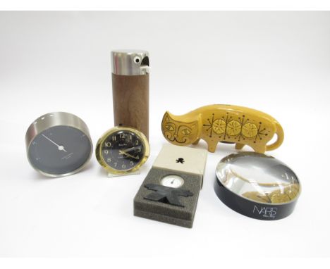 A vintage WMF penguin bird design novelty peanut dispenser, a vintage Pride Creations yellow cat money box, a NARS Man Ray ar