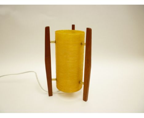 A Rocket table lamp with teak supports and spun fibre shade. 25.5cm high 