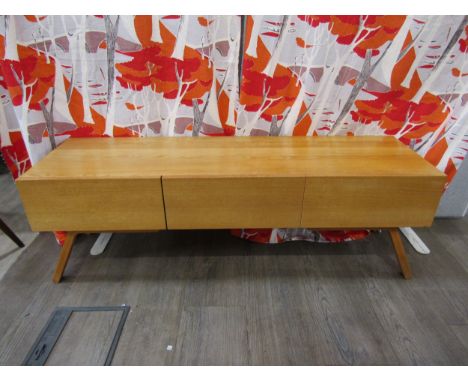 A retro Habitat low sideboard, light oak, three drawer front, on splayed legs. 120cm x  35.5cm x 40cm high 