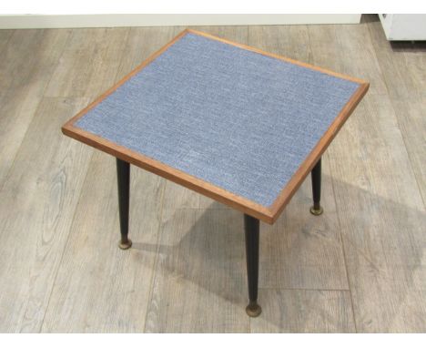 A 1960s formica small side table with abstract design with detachable legs.  33.5cm high x 38cm x  40.5cm 