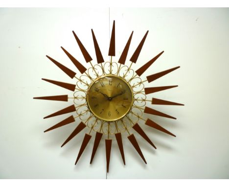 A Paico sunburst wall clock, battery operated, 53cm diameter 
