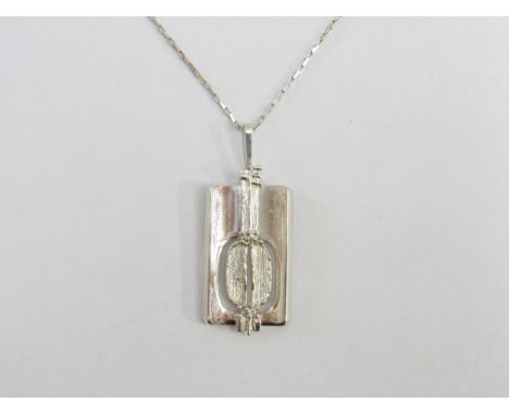 A Modernist Brutalist style sterling silver pendant and vintage box-style silver chain. Stamped marks. 