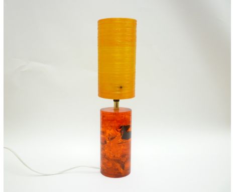 A Shatterline table lamp base in red with a spun fibre shade. 42cm high including shade 