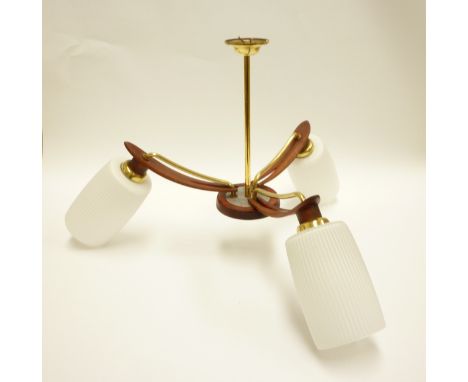 A three branch teak and brassed metal ceiling light with white shades 