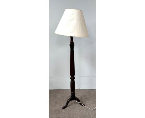 A Regency style standard lamp finely carved on tripod base, 154 cm to top of lamp holder.