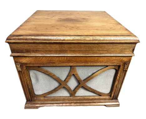 A His Master's Voice record player in oak case, and records, 37 x 45 x 45 cm.