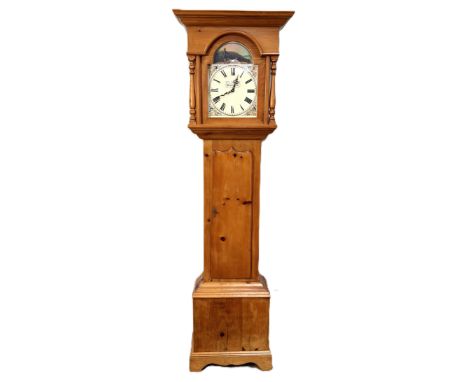 A modern pine longcase clock, the reproduction dial inscribed "Edward Dillon Waterford Made in England", body with shelf to i