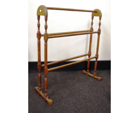 Vintage wooden towel rail turned wood supports. Height 88cm Width 76cm approx.