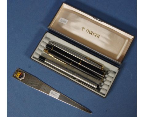 Four various Parker pens including 2 brushed stainless steel ball points; and black and gilt fountain pen and ball point; tog