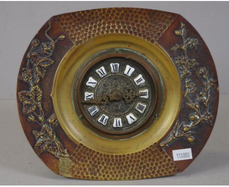 Vintage "New Haven" brass cased clock inscribed verso, with floral decoration in relief, to borders. Untested.  Height 18cm a