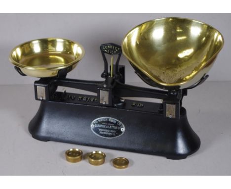 Set Carnegie & Layton Birmingham scales marked to weigh 2 pounds, with brass basins and brass weights for 1 ounce and 2 ounce