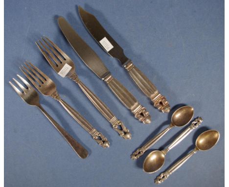 Seven pieces Georg Jensen sterling cutlery Acorn pattern, including cheese knife and fork, another matching knife and fork an