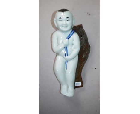Vintage Chinese ceramic wall vase boy with a fish figure. Height 22cm approx.
