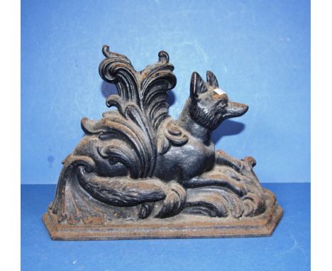 Vintage cast iron seated fox door stop 24cm height approx