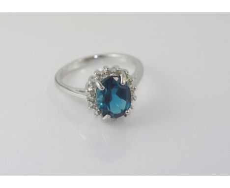 Silver and blue topaz ring size: approx N-O/7