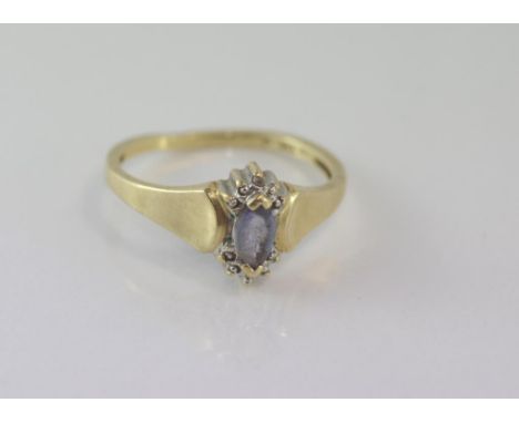 10ct yellow gold, blue paste and diamond ring weight: approx 1.6 grams, size: M-N/6